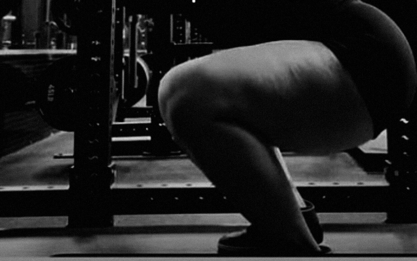 Sema Gilliam at the bottom of a loaded back squat